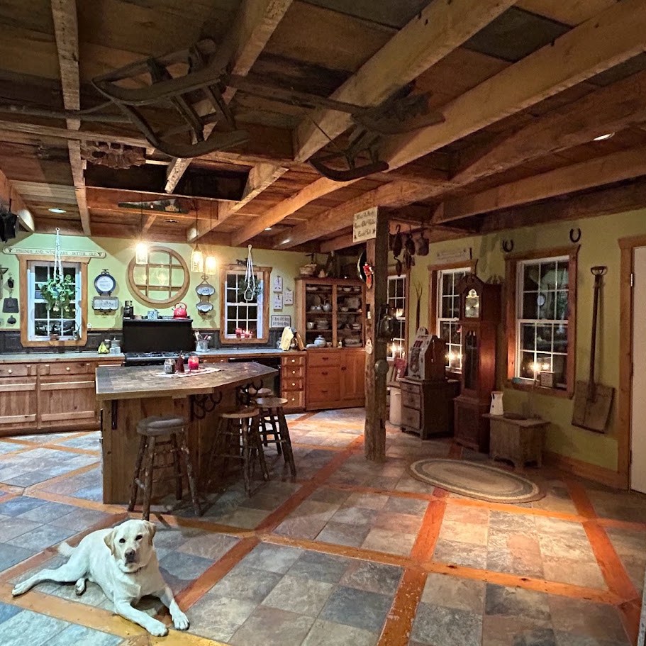 Farm house kitchen with Finn the yellow lab sitting on the tile floor